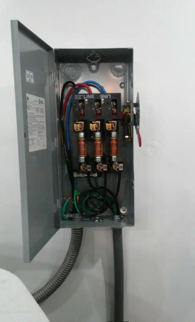 Three-phase disconnect switch installed for Smoke Detector Installation in Aspen