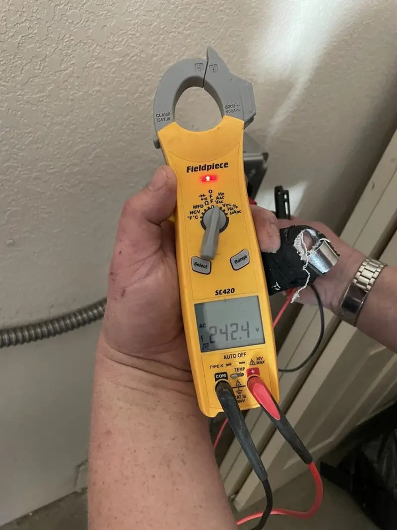 Voltage testing with clamp meter during Generator Installation in Aspen